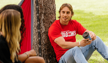 Student sharing latest achievements and life updates with the Dragon alumni network